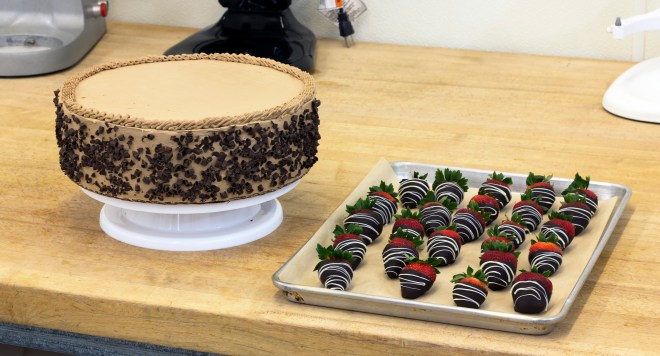 cake with strawberries on side